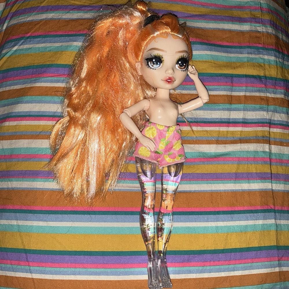 Rainbow High Sparkle Shine Clementine Liquid Clear Sparkle Legs Doll Orange